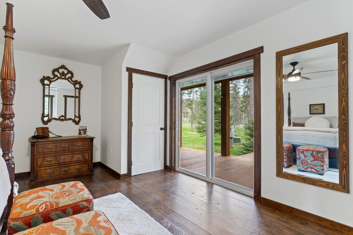 Bedroom with doors to the porch