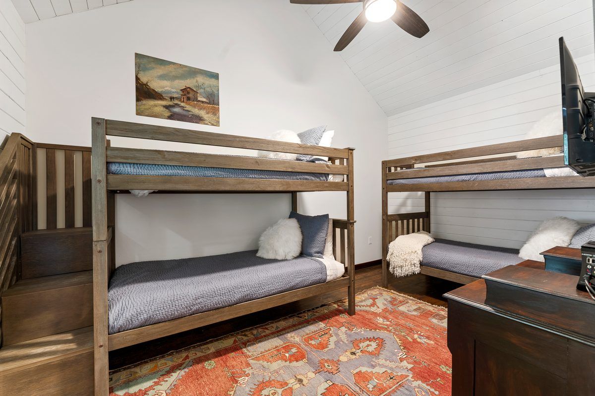 Bunk room with two sets of bunks